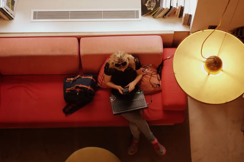 Your Laptop Belongs in a Hostel: How Budget Accommodations Became the New Office